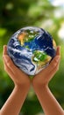 Hands cradle Earth gently, symbolizing importance of environmental stewardship and interconnectedness of all life