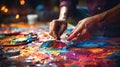 hands crafting a piece of art, representing the creative and expressive side of full-spectrum living. The image focuses on the