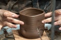 Hands while crafting pottery detail close up Royalty Free Stock Photo