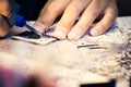 Hands Of Craftsman Carve With Engraving Tool On Table Workbench In Carpentry Royalty Free Stock Photo