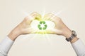 Hands creating a form with recycling sign Royalty Free Stock Photo