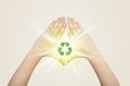 Hands creating a form with recycling sign Royalty Free Stock Photo