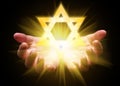 Hands cupped and holding or showing the Star of David. Magen David or Seal of Solomon Royalty Free Stock Photo