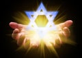 Hands cupped and holding or showing the Star of David. Magen David or Seal of Solomon Royalty Free Stock Photo