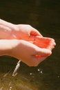 Hands cupping water Royalty Free Stock Photo