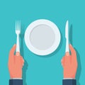 Hands with cutlery and white empty plate. Dinner place setting. Royalty Free Stock Photo