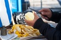 Hands cutting a citron