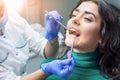 Hands of dentist at work. Royalty Free Stock Photo