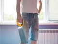 Hands and dirty trousers detail of plasterer man Royalty Free Stock Photo