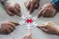 Hands of diverse people assembling jigsaw puzzle, Youth team put Royalty Free Stock Photo