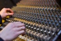 The hands of a DJ on the background, professional audio musical Royalty Free Stock Photo