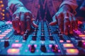 hands of DJ mixes music on DJ console mixer at nightclub in night party