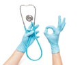 Hands of the doctor holds a stethoscope. This is a medical tool for listening to the heart rhytm and