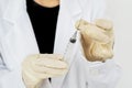 Hands of doctor preparing injection for vaccination Royalty Free Stock Photo