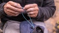 Climbing world: Fisherman knot on a chalk bag