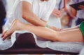 Hands doing foot massage, spa salon Royalty Free Stock Photo