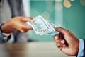 Hands, dollars and businessmen exchanging cash at a bank, making a purchase or deal. Closeup of money, investment and