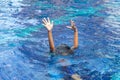 Hands of drown Kid in the deep water, need for help Royalty Free Stock Photo