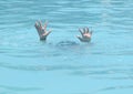 Hands of drowning boy Royalty Free Stock Photo