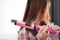 Hands drying woman hair with equipment. Royalty Free Stock Photo