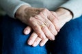 Hands of an elderly widow close up