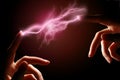 Hands and electric discharge. Royalty Free Stock Photo