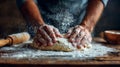 Hands kneading dough with flour flying in a sunlit kitchen during a baking session Royalty Free Stock Photo