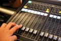 Hands with Equipment for sound mixer control in studio TV stati Royalty Free Stock Photo