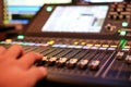 Hands with Equipment for sound mixer control in studio TV stati Royalty Free Stock Photo