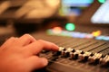 Hands with Equipment for sound mixer control in studio TV stati Royalty Free Stock Photo