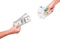Hands exchange dollars for euros. People exchange currency, hands transmit money. Hand holds dollar and euro banknotes. Royalty Free Stock Photo