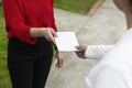 Hands Exchanging a Blank Leaflet Royalty Free Stock Photo