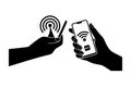 Hands exchanging data via NFC technology on white background Keywords: nfc, technology, contactless Royalty Free Stock Photo