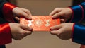 Hands exchanging traditional red envelope for Chinese New Year celebration Royalty Free Stock Photo