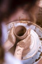 Hands of Experienced Female Potter Working with Clay Lump on Potter`s Wheel in Workshop Royalty Free Stock Photo