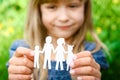 In the hands of the family on a background paper Royalty Free Stock Photo