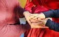 a hands of family, close up. Love. Mom, dad and son are united and friendly in anticipation of the baby. Royalty Free Stock Photo