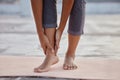 Hands, feet or ankle pain woman on yoga mat in relax workout, training or fitness exercise for health, wellness or Royalty Free Stock Photo