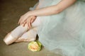 Hands and feet in ballet dots, close-up