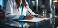 Hands of a female medical professional jotting patient symptoms, emphasizing diligent care