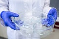 Hands of a female researcher carrying out research in a chemistry lab Royalty Free Stock Photo