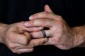 Hands Fidgeting with Ring