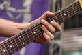 Hands and fingers playing eletric guitar