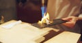 Hands, fire and cooking sushi with chef in restaurant for traditional Japanese food or cuisine closeup. Kitchen, flame Royalty Free Stock Photo