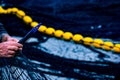 Hands of fisherman work fishing net for tuna Royalty Free Stock Photo