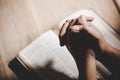 Hands folded in prayer on a Holy Bible in church concept for faith Royalty Free Stock Photo
