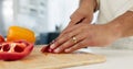 Hands, food and nutrition with a man cooking in the kitchen while cutting vegetables on a wooden chopping board. Salad Royalty Free Stock Photo