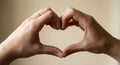 Hands Form Heart Shape to Convey Love, Unity, and Connection Between People Royalty Free Stock Photo