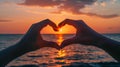 Hands Forming Heart, Sunset Background. Royalty Free Stock Photo