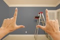 Hands Framing Grey Painted Wall Interior Royalty Free Stock Photo